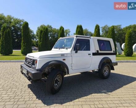 Білий Сузукі Самурай, об'ємом двигуна 1.3 л та пробігом 95 тис. км за 7500 $, фото 1 на Automoto.ua