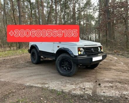 Белый Сузуки Самурай, объемом двигателя 1.9 л и пробегом 250 тыс. км за 28 $, фото 1 на Automoto.ua