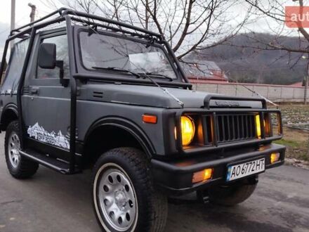 Черный Сузуки Самурай, объемом двигателя 1.3 л и пробегом 199 тыс. км за 3199 $, фото 1 на Automoto.ua