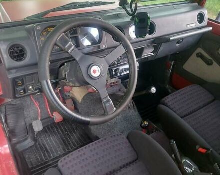 Красный Сузуки Самурай, объемом двигателя 1.33 л и пробегом 137 тыс. км за 5500 $, фото 2 на Automoto.ua