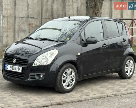 Черный Сузуки Сплеш, объемом двигателя 1.24 л и пробегом 200 тыс. км за 4500 $, фото 1 на Automoto.ua