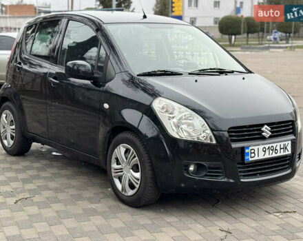Черный Сузуки Сплеш, объемом двигателя 1.24 л и пробегом 200 тыс. км за 4500 $, фото 2 на Automoto.ua