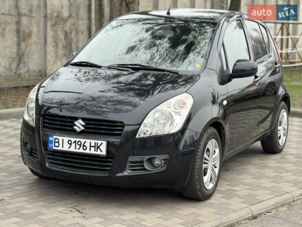 Черный Сузуки Сплеш, объемом двигателя 1.24 л и пробегом 200 тыс. км за 4500 $, фото 1 на Automoto.ua