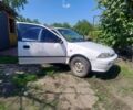 Білий Сузукі Свифт, об'ємом двигуна 9 л та пробігом 400 тис. км за 562 $, фото 2 на Automoto.ua
