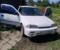 Белый Сузуки Свифт, объемом двигателя 9 л и пробегом 400 тыс. км за 559 $, фото 1 на Automoto.ua
