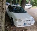 Белый Сузуки Свифт, объемом двигателя 1.3 л и пробегом 400 тыс. км за 1550 $, фото 1 на Automoto.ua