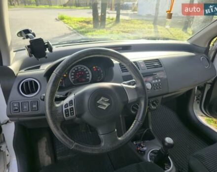 Білий Сузукі Свифт, об'ємом двигуна 1.33 л та пробігом 134 тис. км за 4200 $, фото 10 на Automoto.ua