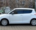 Білий Сузукі Свифт, об'ємом двигуна 1.2 л та пробігом 57 тис. км за 9900 $, фото 4 на Automoto.ua
