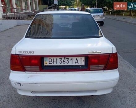 Белый Сузуки Свифт, объемом двигателя 1.3 л и пробегом 125 тыс. км за 750 $, фото 4 на Automoto.ua