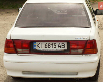 Белый Сузуки Свифт, объемом двигателя 1.3 л и пробегом 236 тыс. км за 2100 $, фото 1 на Automoto.ua