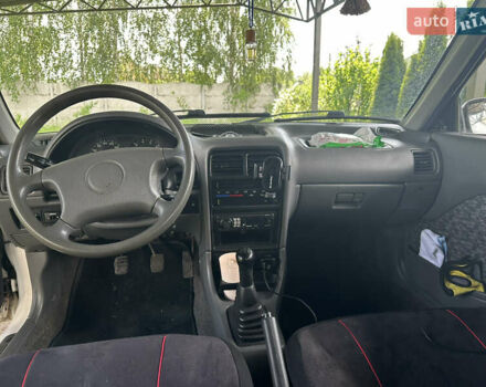 Белый Сузуки Свифт, объемом двигателя 1.3 л и пробегом 236 тыс. км за 2100 $, фото 7 на Automoto.ua