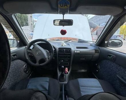 Білий Сузукі Свифт, об'ємом двигуна 1.32 л та пробігом 315 тис. км за 1500 $, фото 2 на Automoto.ua