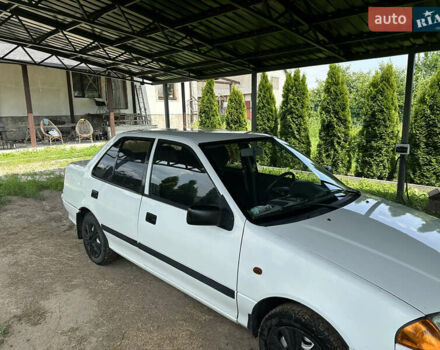 Белый Сузуки Свифт, объемом двигателя 1.3 л и пробегом 236 тыс. км за 2100 $, фото 5 на Automoto.ua