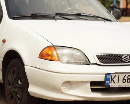 Белый Сузуки Свифт, объемом двигателя 1.3 л и пробегом 236 тыс. км за 2100 $, фото 3 на Automoto.ua