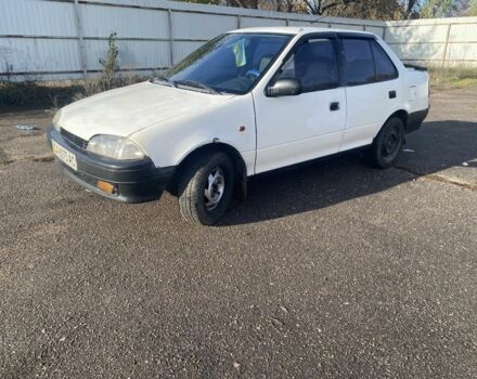 Белый Сузуки Свифт, объемом двигателя 1.3 л и пробегом 250 тыс. км за 500 $, фото 1 на Automoto.ua