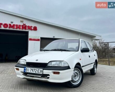 Білий Сузукі Свифт, об'ємом двигуна 1.6 л та пробігом 150 тис. км за 1200 $, фото 1 на Automoto.ua