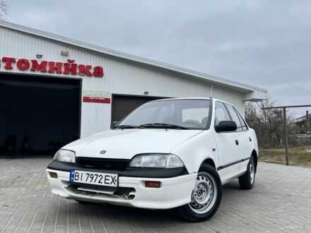 Білий Сузукі Свифт, об'ємом двигуна 1.6 л та пробігом 100 тис. км за 1200 $, фото 1 на Automoto.ua