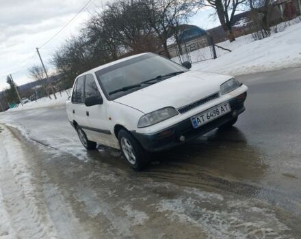 Білий Сузукі Свифт, об'ємом двигуна 1.3 л та пробігом 300 тис. км за 600 $, фото 1 на Automoto.ua