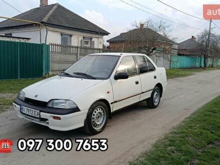 Белый Сузуки Свифт, объемом двигателя 1.59 л и пробегом 150 тыс. км за 1150 $, фото 1 на Automoto.ua