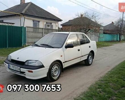 Белый Сузуки Свифт, объемом двигателя 1.59 л и пробегом 150 тыс. км за 1150 $, фото 1 на Automoto.ua