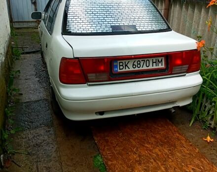 Белый Сузуки Свифт, объемом двигателя 1.3 л и пробегом 180 тыс. км за 1870 $, фото 1 на Automoto.ua