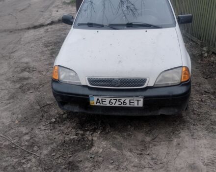 Белый Сузуки Свифт, объемом двигателя 1.3 л и пробегом 21 тыс. км за 500 $, фото 1 на Automoto.ua