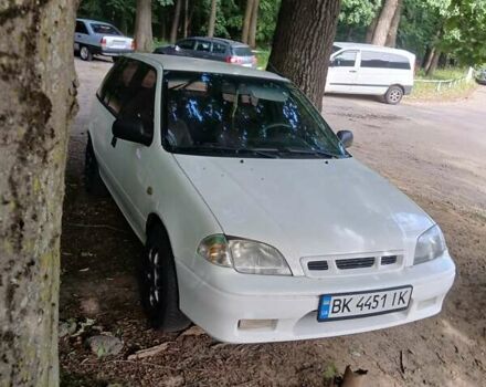 Белый Сузуки Свифт, объемом двигателя 1.3 л и пробегом 400 тыс. км за 1550 $, фото 1 на Automoto.ua