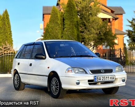 Білий Сузукі Свифт, об'ємом двигуна 1.3 л та пробігом 187 тис. км за 2550 $, фото 1 на Automoto.ua