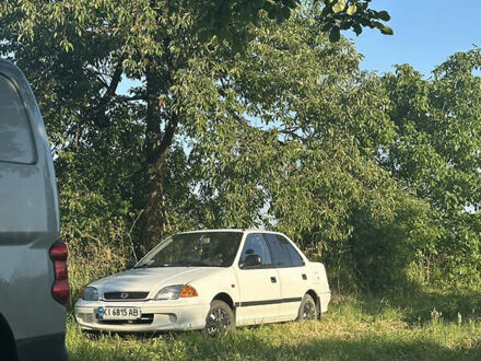 Белый Сузуки Свифт, объемом двигателя 1.3 л и пробегом 236 тыс. км за 2100 $, фото 1 на Automoto.ua