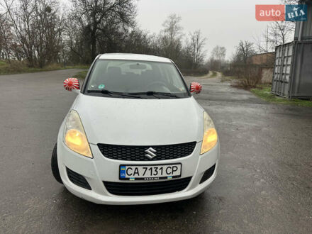 Білий Сузукі Свифт, об'ємом двигуна 1.24 л та пробігом 147 тис. км за 5150 $, фото 1 на Automoto.ua