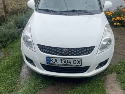Білий Сузукі Свифт, об'ємом двигуна 1.2 л та пробігом 234 тис. км за 5500 $, фото 1 на Automoto.ua