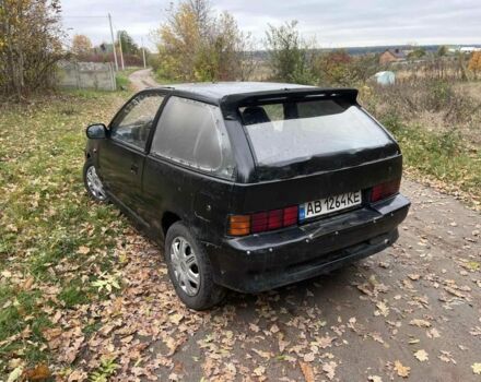 Чорний Сузукі Свифт, об'ємом двигуна 1.3 л та пробігом 320 тис. км за 500 $, фото 4 на Automoto.ua