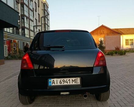 Чорний Сузукі Свифт, об'ємом двигуна 1.3 л та пробігом 220 тис. км за 4100 $, фото 1 на Automoto.ua