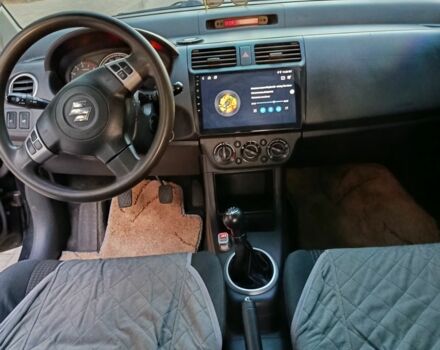 Чорний Сузукі Свифт, об'ємом двигуна 1.3 л та пробігом 220 тис. км за 4100 $, фото 4 на Automoto.ua