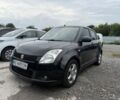 Чорний Сузукі Свифт, об'ємом двигуна 1.3 л та пробігом 177 тис. км за 4487 $, фото 1 на Automoto.ua