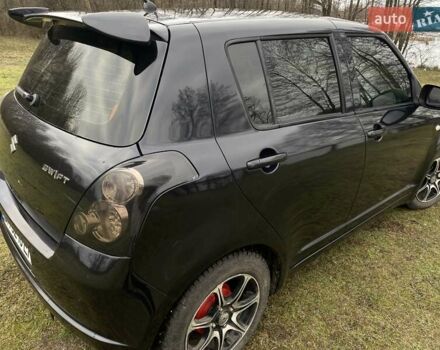 Чорний Сузукі Свифт, об'ємом двигуна 1.49 л та пробігом 206 тис. км за 5500 $, фото 4 на Automoto.ua