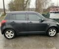 Чорний Сузукі Свифт, об'ємом двигуна 1.3 л та пробігом 245 тис. км за 4300 $, фото 5 на Automoto.ua
