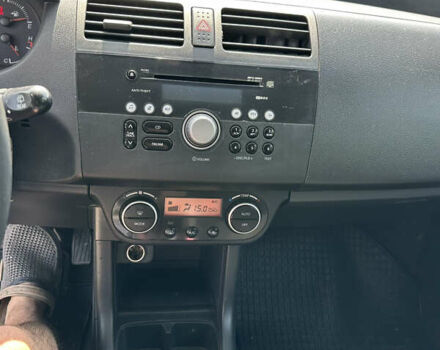 Чорний Сузукі Свифт, об'ємом двигуна 1.33 л та пробігом 229 тис. км за 3799 $, фото 14 на Automoto.ua