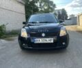 Чорний Сузукі Свифт, об'ємом двигуна 1.3 л та пробігом 230 тис. км за 4650 $, фото 1 на Automoto.ua