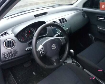 Черный Сузуки Свифт, объемом двигателя 1.49 л и пробегом 146 тыс. км за 5000 $, фото 24 на Automoto.ua