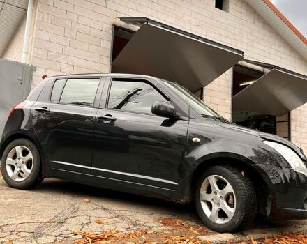 Черный Сузуки Свифт, объемом двигателя 1.3 л и пробегом 233 тыс. км за 5000 $, фото 1 на Automoto.ua