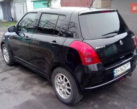 Черный Сузуки Свифт, объемом двигателя 1.49 л и пробегом 146 тыс. км за 5000 $, фото 2 на Automoto.ua