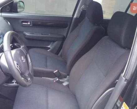 Черный Сузуки Свифт, объемом двигателя 1.49 л и пробегом 146 тыс. км за 5000 $, фото 12 на Automoto.ua