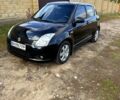 Чорний Сузукі Свифт, об'ємом двигуна 1.5 л та пробігом 215 тис. км за 6000 $, фото 1 на Automoto.ua