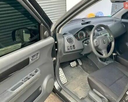 Чорний Сузукі Свифт, об'ємом двигуна 1.49 л та пробігом 142 тис. км за 6500 $, фото 15 на Automoto.ua