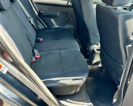 Чорний Сузукі Свифт, об'ємом двигуна 1.33 л та пробігом 229 тис. км за 3799 $, фото 22 на Automoto.ua