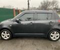 Чорний Сузукі Свифт, об'ємом двигуна 1.3 л та пробігом 245 тис. км за 4300 $, фото 1 на Automoto.ua