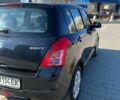 Чорний Сузукі Свифт, об'ємом двигуна 1.3 л та пробігом 215 тис. км за 4500 $, фото 4 на Automoto.ua