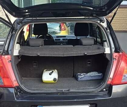 Чорний Сузукі Свифт, об'ємом двигуна 1.33 л та пробігом 164 тис. км за 3900 $, фото 11 на Automoto.ua