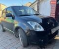 Черный Сузуки Свифт, объемом двигателя 1.33 л и пробегом 125 тыс. км за 4000 $, фото 1 на Automoto.ua